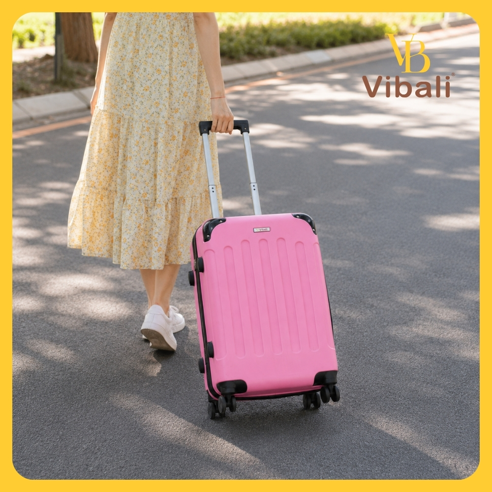 người nữ kéo Vali nhựa VBV046 hồng